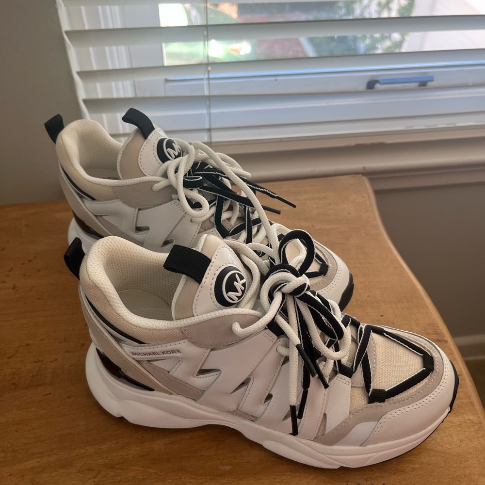 Michael Kors  tennis shoes size 7.5 can be athletic or casual shoes.